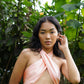 Apricot Seidenschal als Top von Lola Tong getragen von Model aus Hawaii.